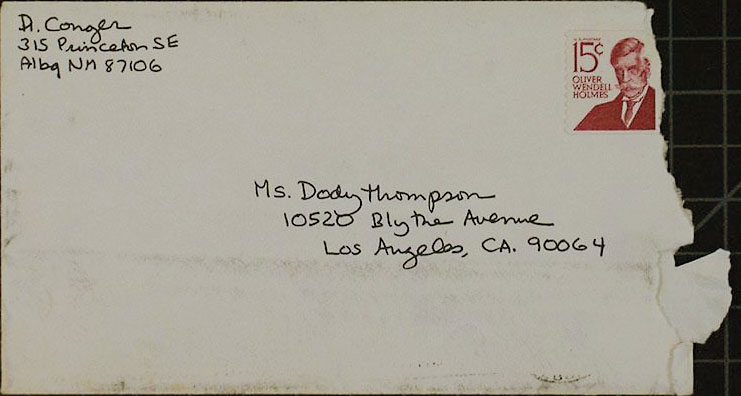 Portrait of Beaumont Newhall with Photographs