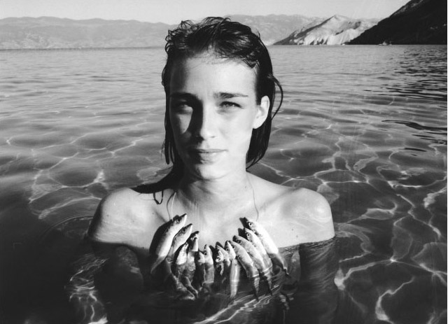 Girl with Necklace of Fish