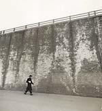 Arthur Tress - A Hassidic Rabbi Walks across a Highway Underpass, Brooklyn, NY
Click for more Images